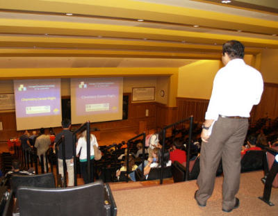 Filling lecture hall with participants